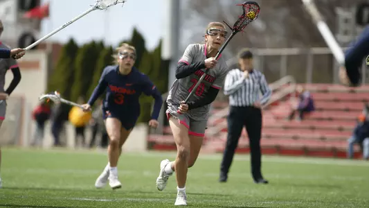 Allegra Catalano charges in on a free-position shot vs. UVA