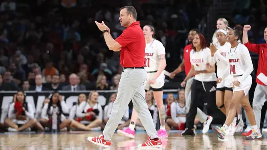 Louisville women's basketball celebrates during the win over Tennessee.