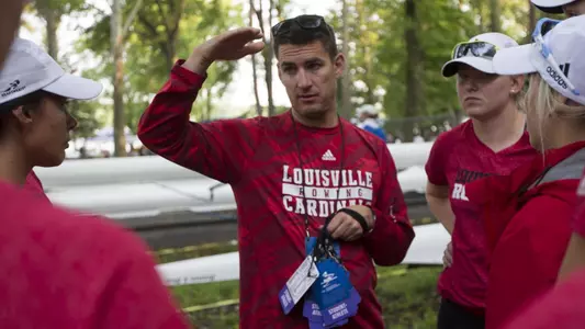 Derek Copeland talks to rowers