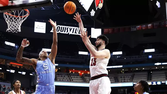 Gabe Wiznitzer puts up a baseline jumper against North Carolina in the KFC Yum! Center on Feb. 1, 2022.