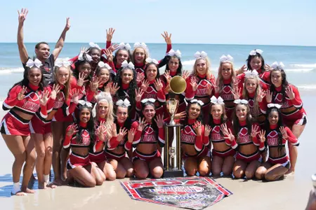 All Girl squad poses with their national championship trophy