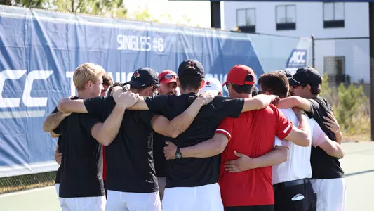 Team huddle vs. Virginia