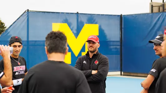Rodrigo da Silva talks to team during NCAAs