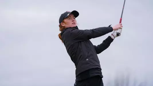 Carmen Griffiths hits ball toward the pin