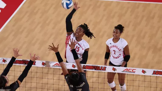 Aiko Jones hits past the block