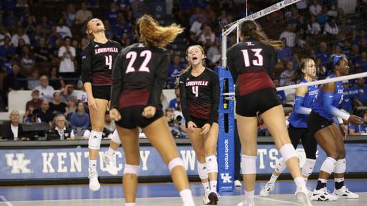 Claire Chaussee and Alexa Hendriks celebrate against Kentucky