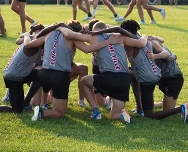 Louisville Men Huddle Before John McNichols invitational