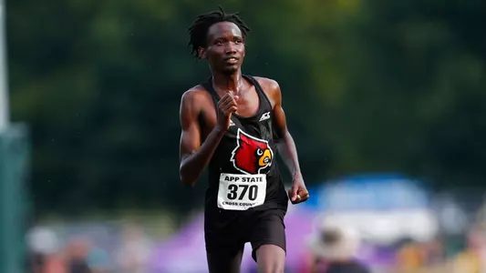 Ian Kibiwot runs at the Covered Bridge Open