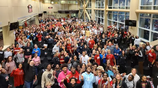 Dr. Derek Greenfield and UofL student-athletes group photo following the workshop