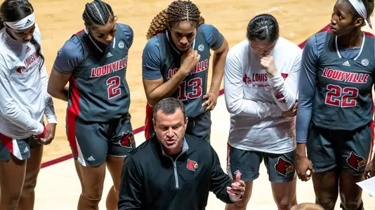 Walz in the huddle against VT