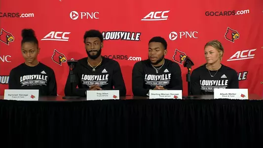 Synclair Savage, Trey Allen, Sterling Warner-Savage and Aliyah Welter meet with the media