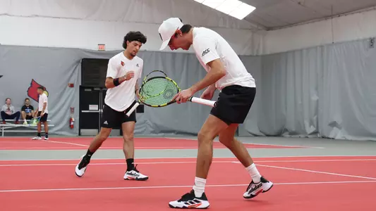Alex Wesbrooks and Matthew Fung celebrate against UIC