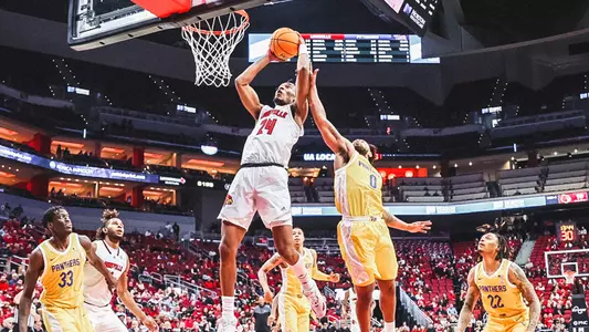 Jae'Lyn Withers attacks the basket against Pitt on Jan. 18, 2023 at the KFC Yum! Center.