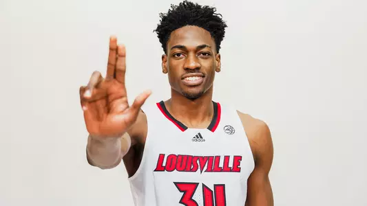 A photo announcing the addition of new Louisville men's basketball freshman Emmanuel Okorafor.