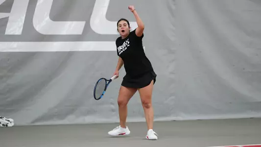 Maria Campos celebrates her clinching of the match