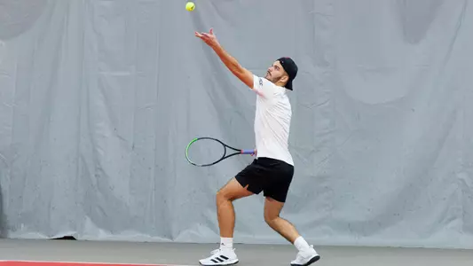 Natan Rodrigues serves against Bellarmine