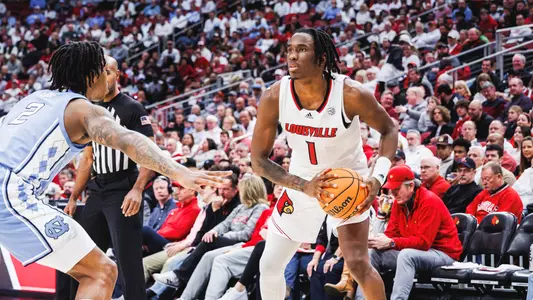 Mike James prepares to pass the ball against North Carolina on Jan. 14, 2023.