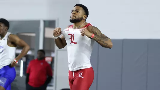 Sterling Warner-Savage celebrates after tying the 60m dash school record at the PNC Lenny Lyles Invitational
