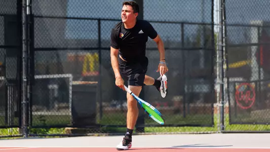 Sergio Hernandez serves the ball