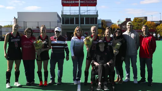 Louisville seniors Aimee Plumb, Mia Duchars and Sofia Pendolino with their parents for Senior Day