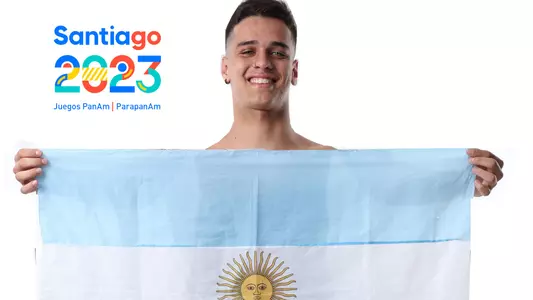 Matias Santiso poses with the Argentine flag