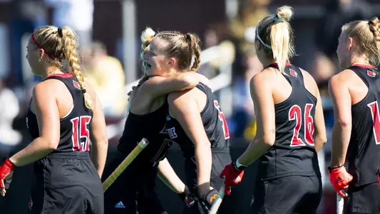 Louisville field hockey celebrates a goal vs. Appalachian State