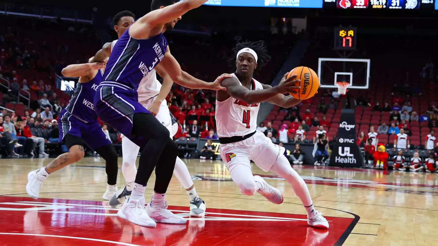 Ty-Laur Johnson drives the ball against Kentucky Wesleyan in an exhibition on Oct. 30, 2023.