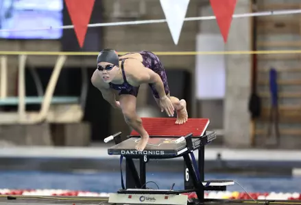 Paige Kuwata on the starting blocks.