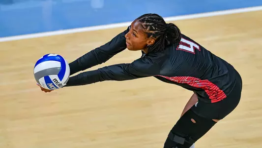 Charitie Luper passes the ball