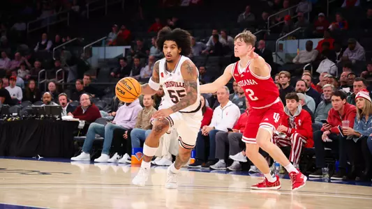 Skyy Clark drives against Indiana in the 2023 Empire Classic at Madison Square Garden in New York.
