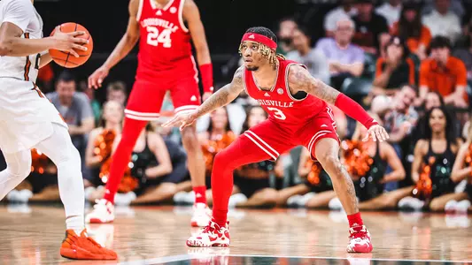 El Ellis defends at Miami on Feb. 15, 2023.