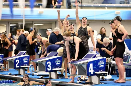 200 Medley relay celebrates a school record