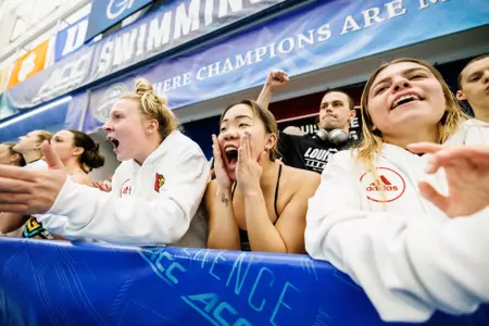 Paige Kuwata cheers from the sidelines at the ACC Championships