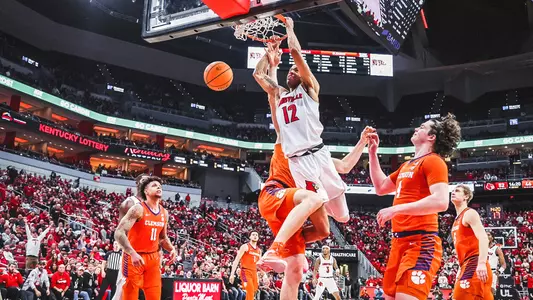 JJ Traynor dunks against Clemson on Feb. 18, 2023 at the KFC Yum! Center.