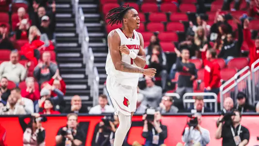 Mike James celebrates during Louisville men's basketball's game against Georgia Tech on Feb. 1, 2023.