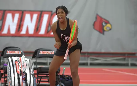 Tyra Richardson celebrates her win in singles