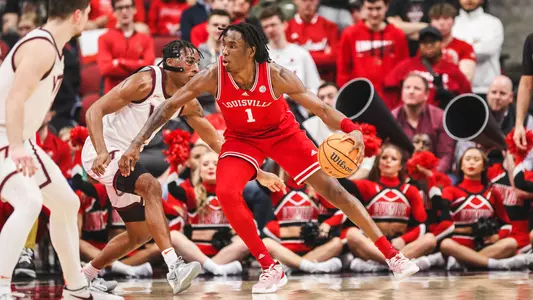 Mike James posts up against Virginia Tech on Feb. 28, 2023.