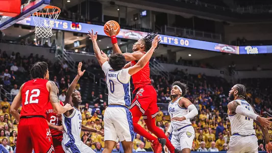 Mike James drives to the basket at Pitt on Feb. 7, 2023.