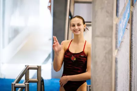 Lindsay Gizzi throws up her L's on the diving platform