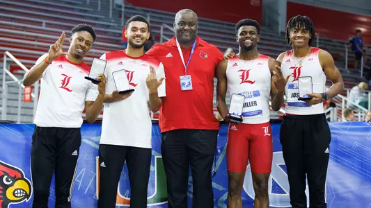 Tony Miller celebrates with the men's 4x400m relay team after the ACC Indoor Championships
