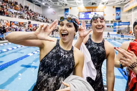 Gabi Albiero and Christiana Regenauer celebrate on deck