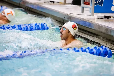 Abdelrahman El-Araby checks his time after swimming the 50 free at NCAAs.