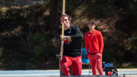 Paul Kallenberg competes in the pole vault at the Yellow Jacket Invitational