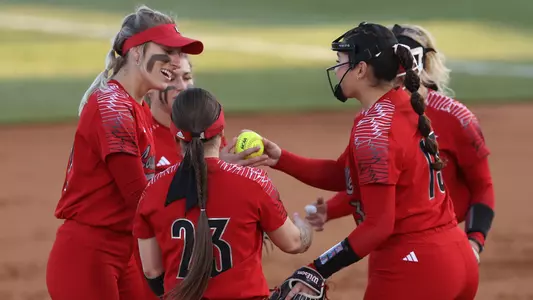 Softball infield huddle at Kentucky