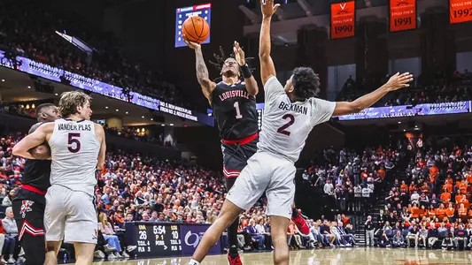 Mike James attacks the basket at Virginia on March 4, 2023.