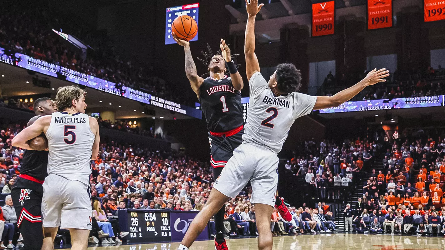 Mike James attacks the basket at Virginia on March 4, 2023.