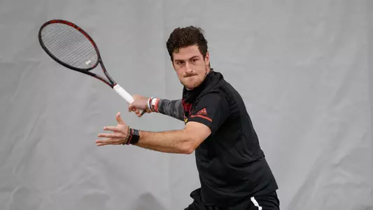 Federico Gomez returns the ball