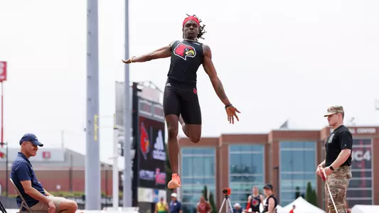 Jeremiah Willis competes in the long jump at the Clark Wood Invitational