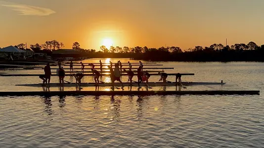 Cardinals put in their boat in the water at the pier in Sarasota