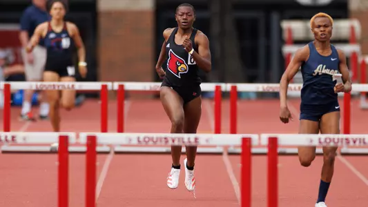 Katie Martin breaks the women's 400m hurdles school record